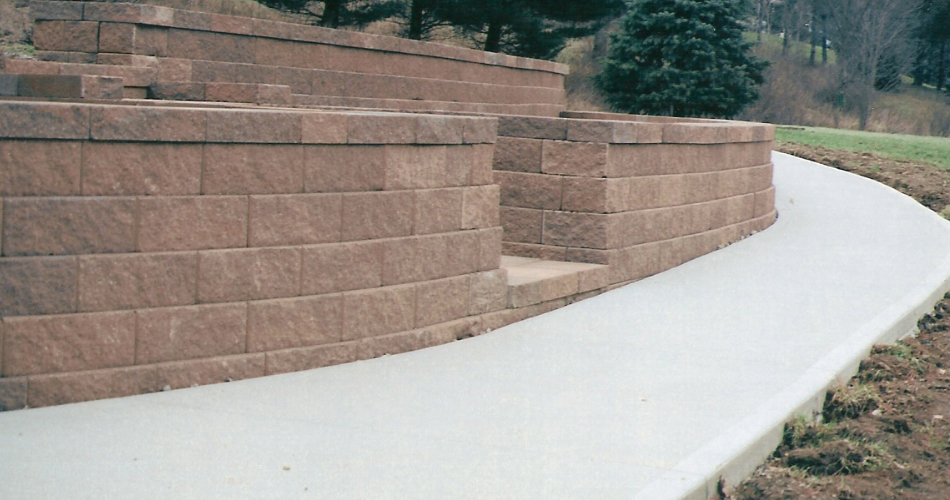 Retaining Wall with Concrete Sidewalk Retaining Wall with Concrete Sidewalk